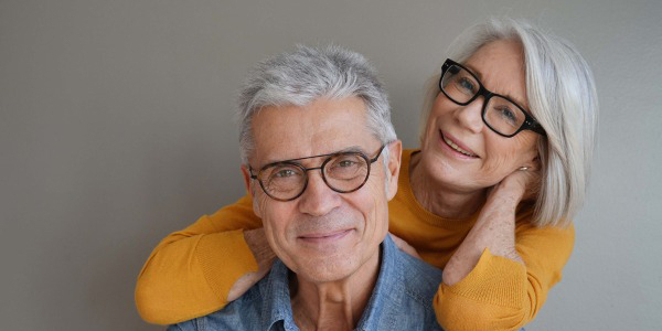 Older couple wearing glasses