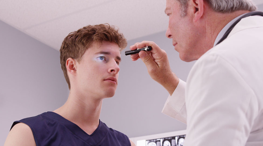 Football Trivia: How Can An Eye Doctor Help Athletes After a Head Injury?